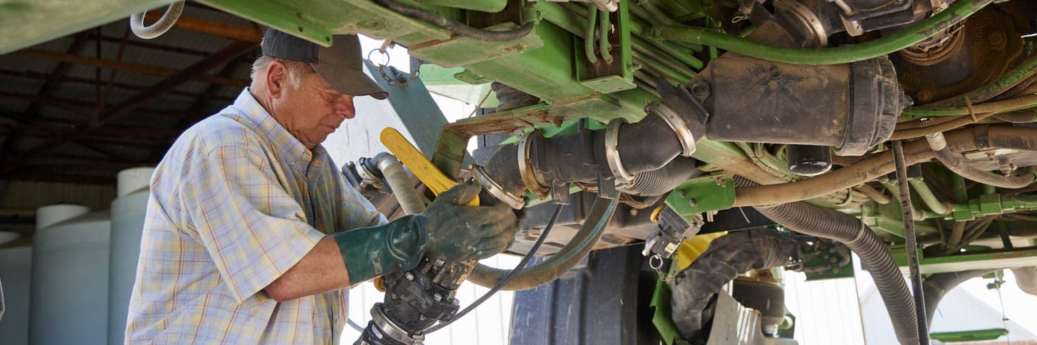 Bob looking at farm equipment