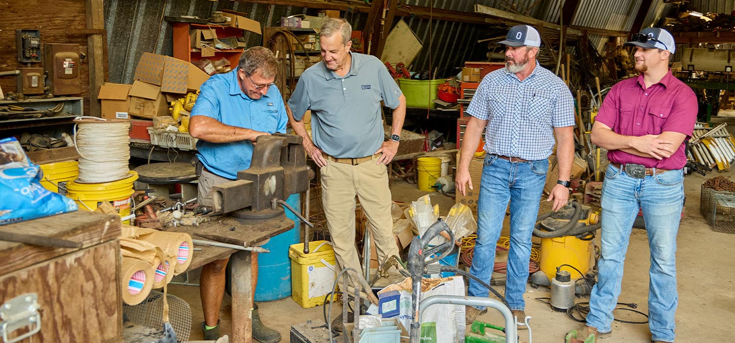 Producer Donald Chase and golden peanut reps on chase farm