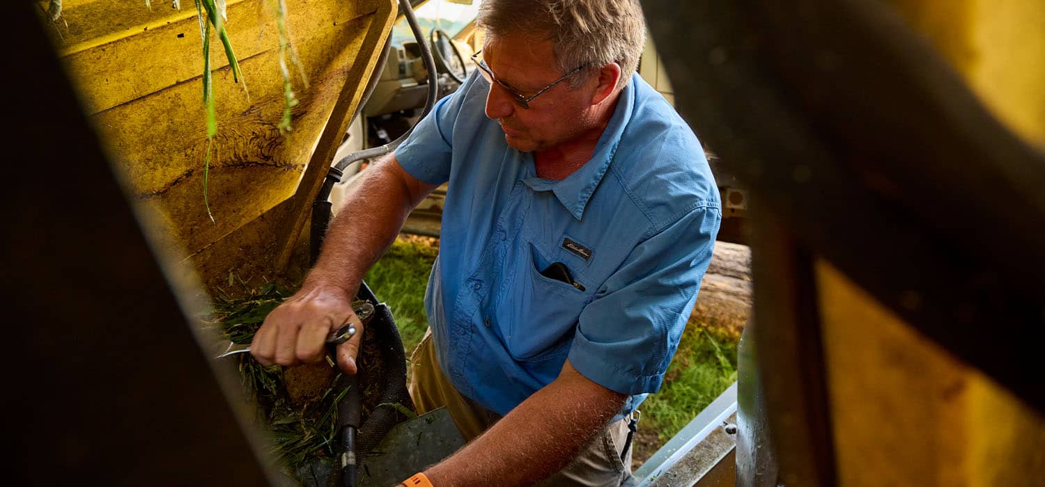 Producer, Donald Chase using a Peanut harvester