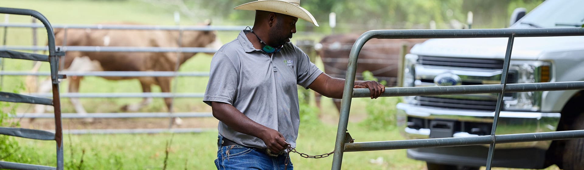 Emmanuel Bankston opening a gate